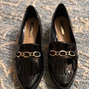 Tahari Black and Gold Loafers with Fringe Detail